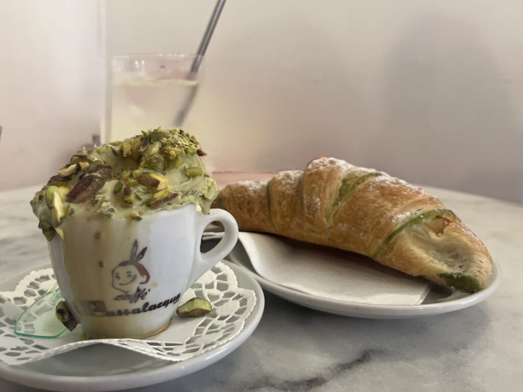 image shows cafe called Lilla Espresso Bar's pistachio affogato and croissant