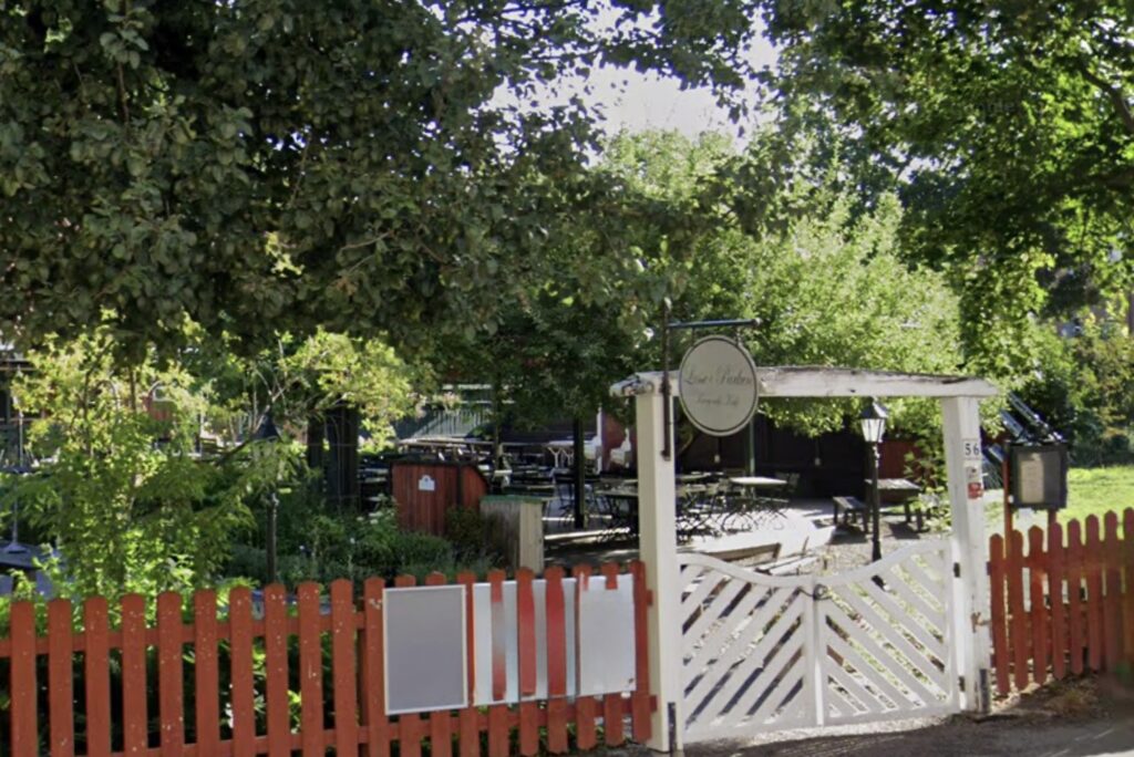 image shows restaurant in a park