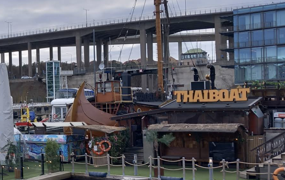 image shows Thai boat restaurant